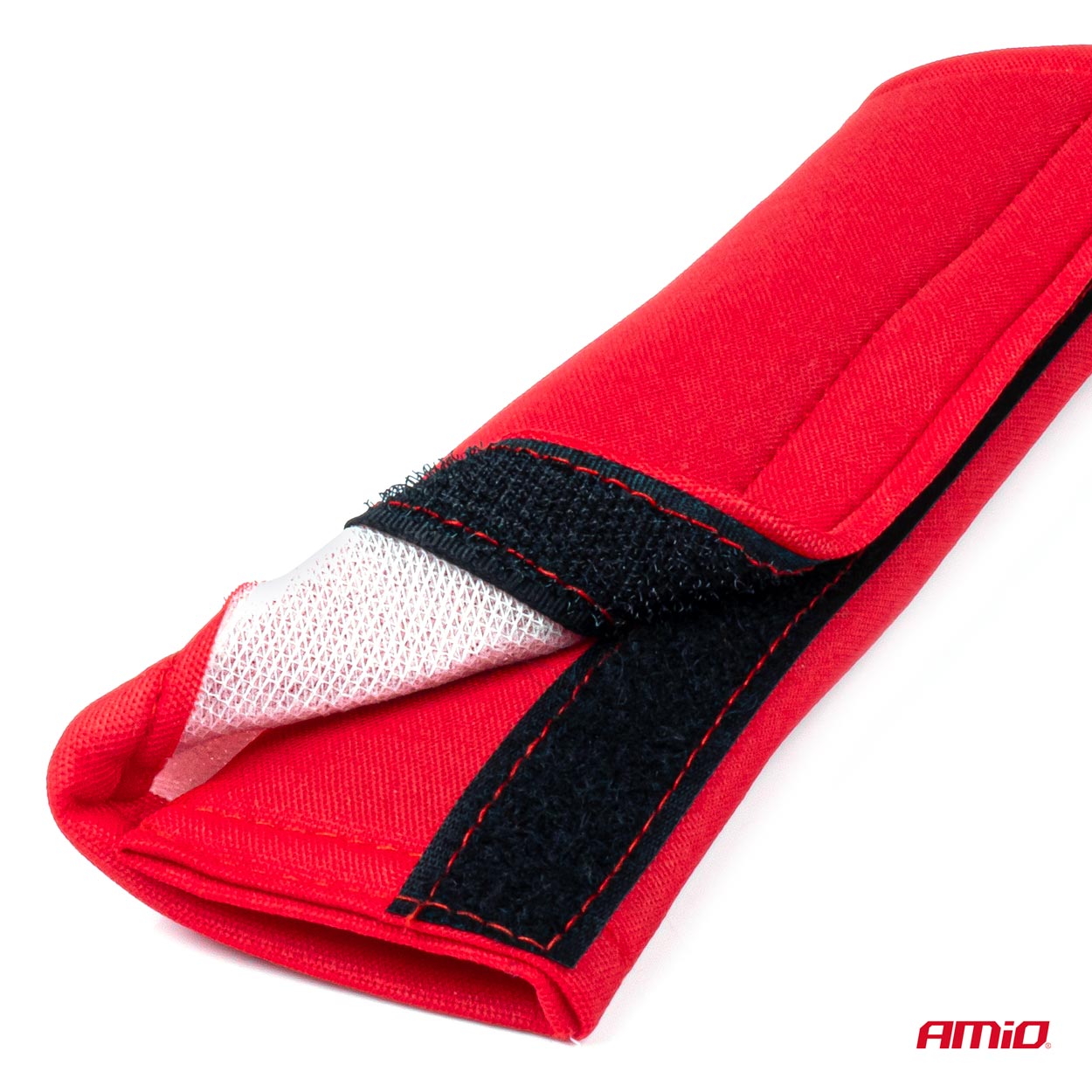 Veiligheidsgordelpad met klittenbandbevestiging.